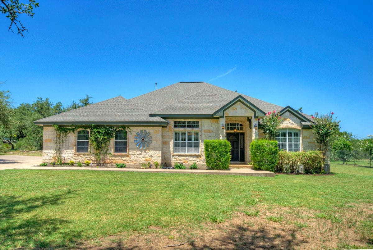 View 12225 Triple Creek Cir in Triple Creek Ranch Sec 1 12225 Triple Creek Cir - front exterior - Luxury home in Triple Creek Ranch Sec 1, Dripping Springs, TX