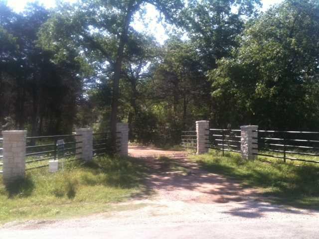View 1229 Peach Creek RD 1229 Peach Creek RD - front exterior - Luxury home in Rosanky, TX