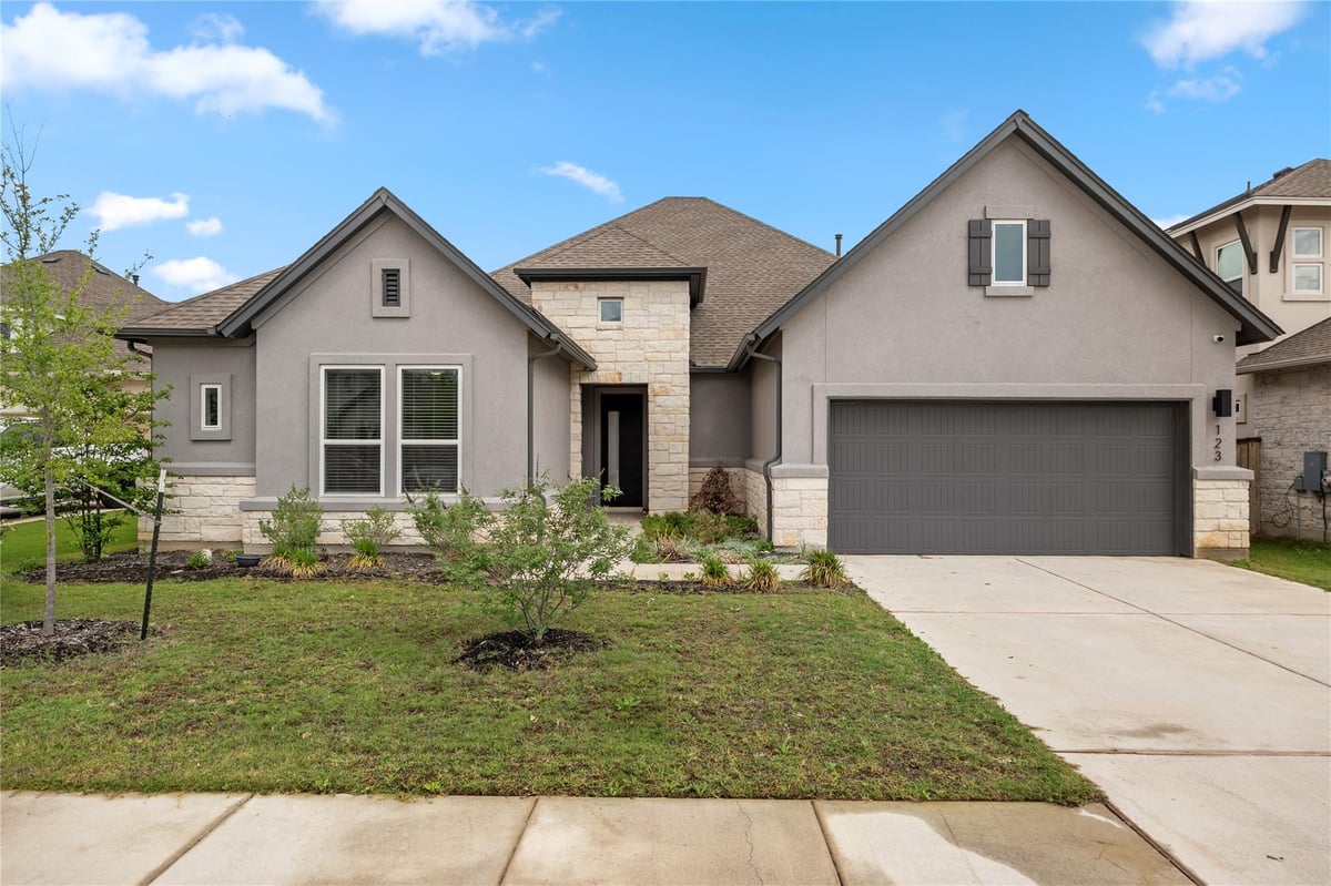 View 123 Lake Charlotte Creek Dr in Colony Mud 1C Sec 1 123 Lake Charlotte Creek Dr - front exterior - Luxury home in Colony Mud 1C Sec 1, Bastrop, TX