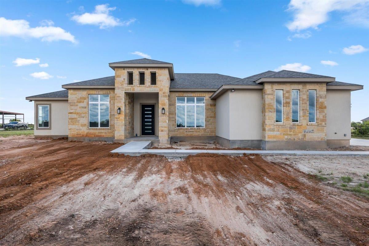 View 123 Lila LN in Bertram Creekside Ranches 123 Lila LN - front exterior - Luxury home in Bertram Creekside Ranches, Bertram, TX