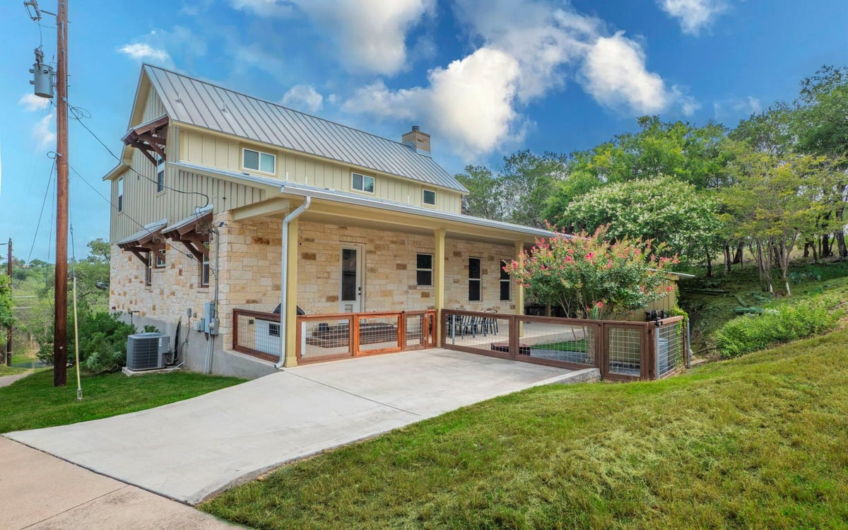 Front exterior with Metal roof with standing seam detail at 123  Vicinity Trl - 3 bed 2 bath home