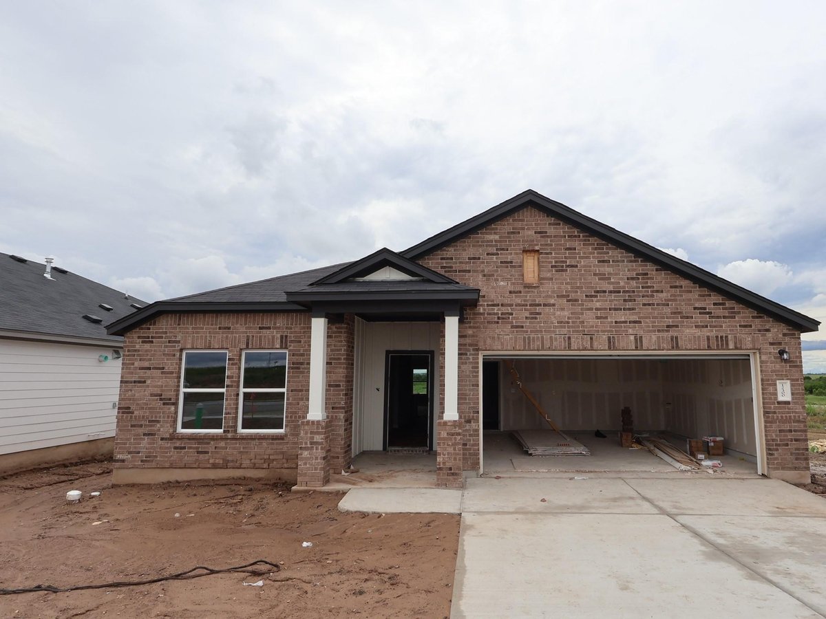 View 12300 Setting Peak LN in Willow Springs 12300 Setting Peak LN - front exterior - Luxury home in Willow Springs, Buda, TX
