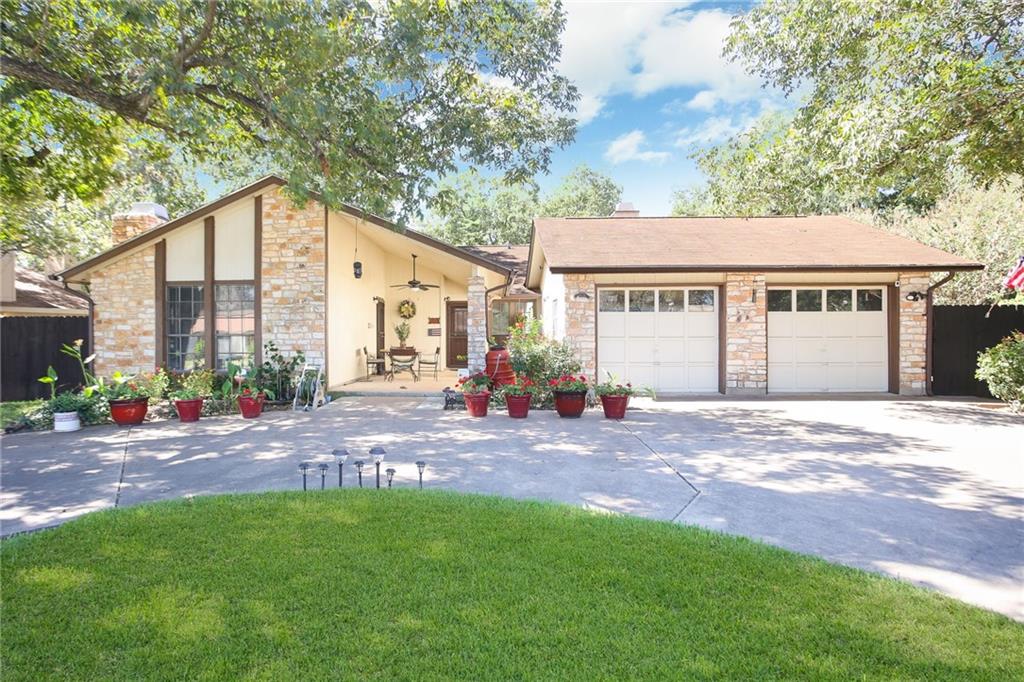 View 12302 Burr Ridge Unit #A & B in Springwoods Sec 01 12302 Burr Ridge Unit #A & B - front exterior - Luxury home in Springwoods Sec 01, Austin, TX