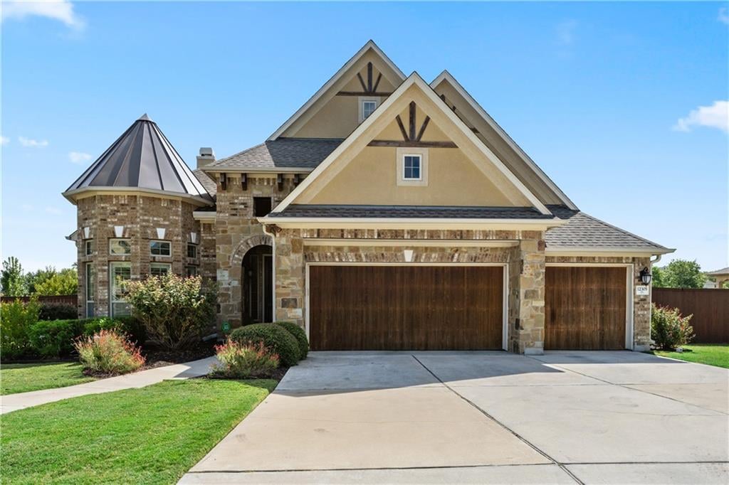 View 12305 Lostwood Cir in Bridges At Bear Creek Ph 2 SE 12305 Lostwood Cir - front exterior - Luxury home in Bridges At Bear Creek Ph 2 SE, Austin, TX