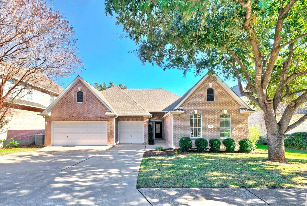 View 12306 Carlsbad Dr in Lake Pointe 12306 Carlsbad Dr - front exterior - Luxury home in Lake Pointe, Austin, TX