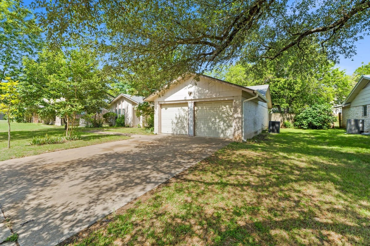 View 12306 Split Rail Pkwy in Village 2 At Anderson Mill 12306 Split Rail Pkwy - front exterior - Luxury home in Village 2 At Anderson Mill, Austin, TX