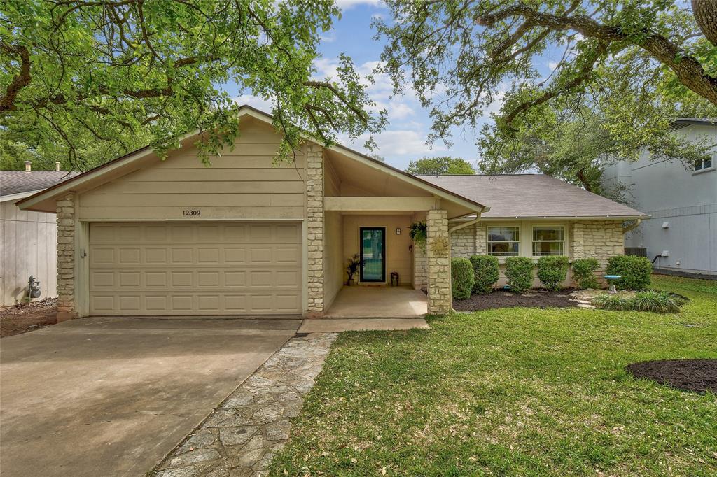 View 12309 Wycliff Ln in Milwood Sec 08 12309 Wycliff Ln - front exterior - Luxury home in Milwood Sec 08, Austin, TX