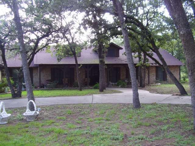 View 1232 County Road 231 1232 County Road 231 - front exterior - Luxury home in Giddings, TX