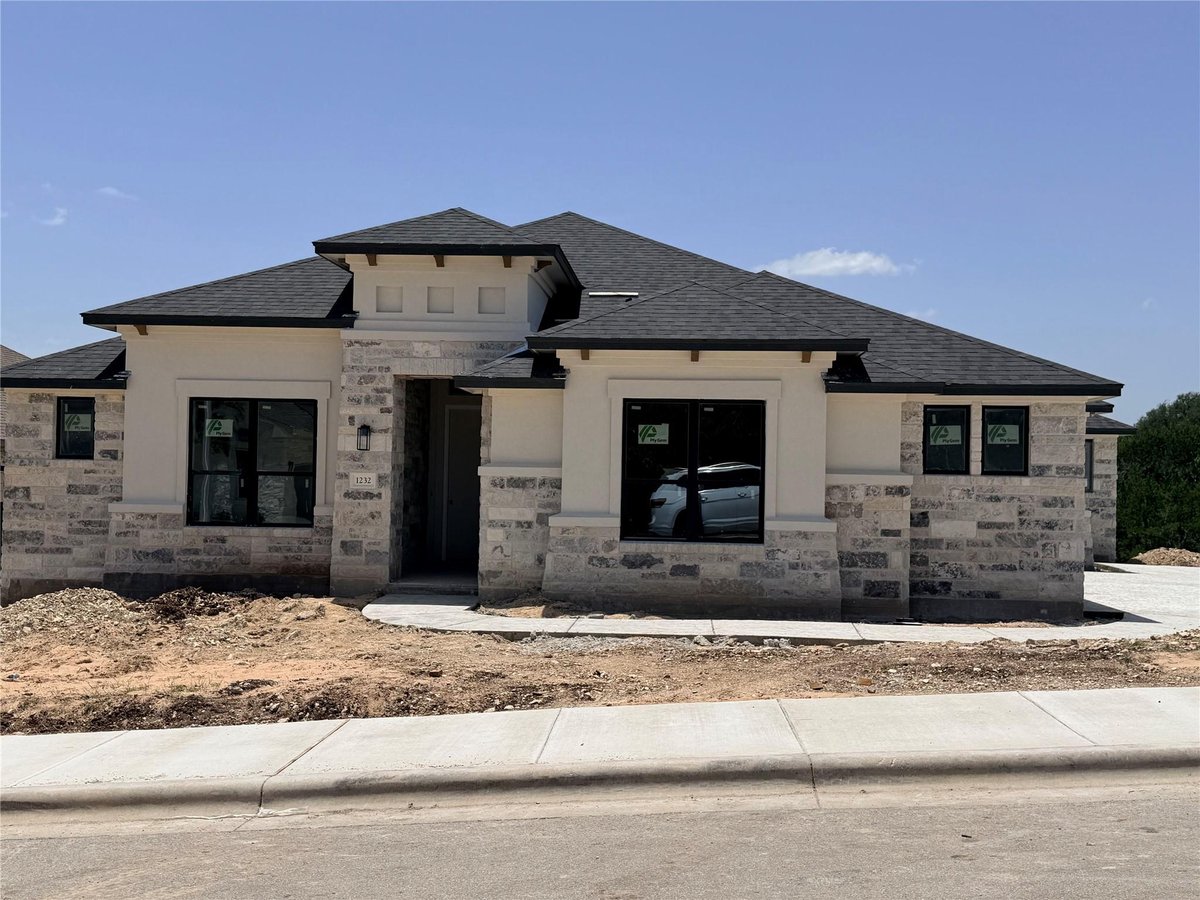 View 1232 Stormy DR in Riverstone Ph A 1232 Stormy DR - front exterior - Luxury home in Riverstone Ph A, Georgetown, TX