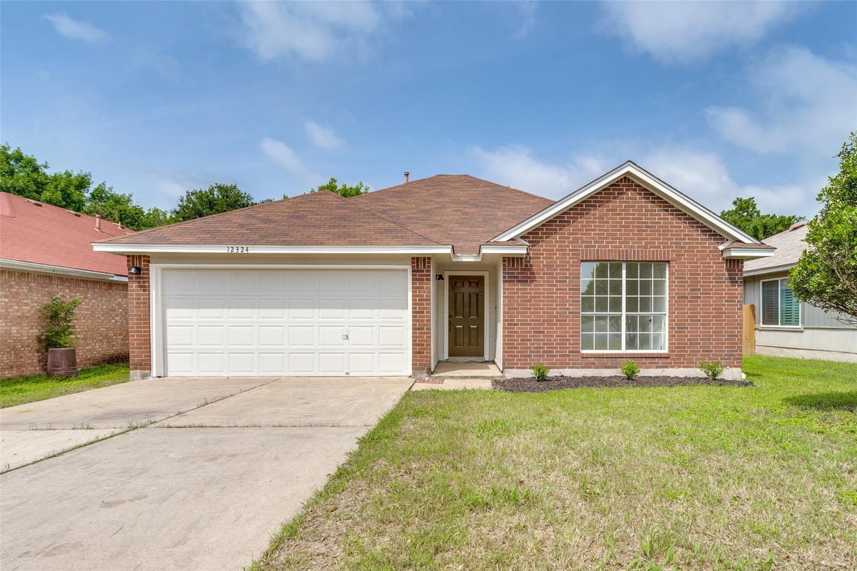 View 12324 Shropshire Blvd in Copperfield 12324 Shropshire Blvd - front exterior - Luxury home in Copperfield, Austin, TX