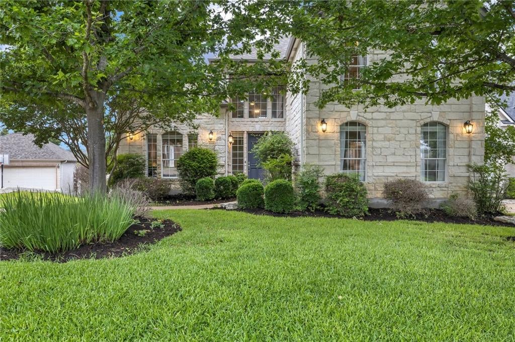 View 12325 Carlsbad Dr in Lake Pointe Ph 04-A 12325 Carlsbad Dr - front exterior - Luxury home in Lake Pointe Ph 04-A, Austin, TX