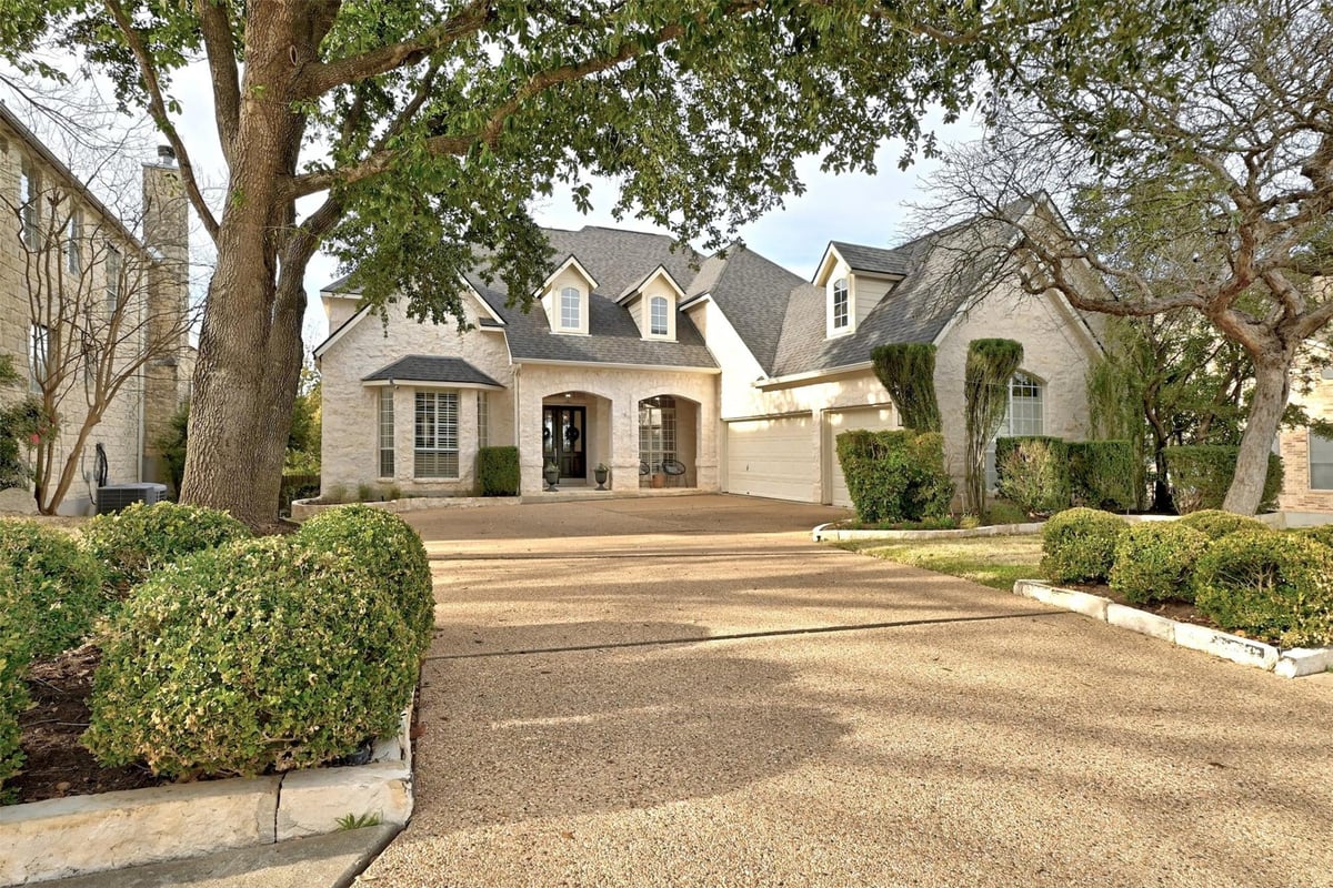 View 12327 Carlsbad Dr in Lake Pointe Ph 04-A 12327 Carlsbad Dr - front exterior - Luxury home in Lake Pointe Ph 04-A, Austin, TX
