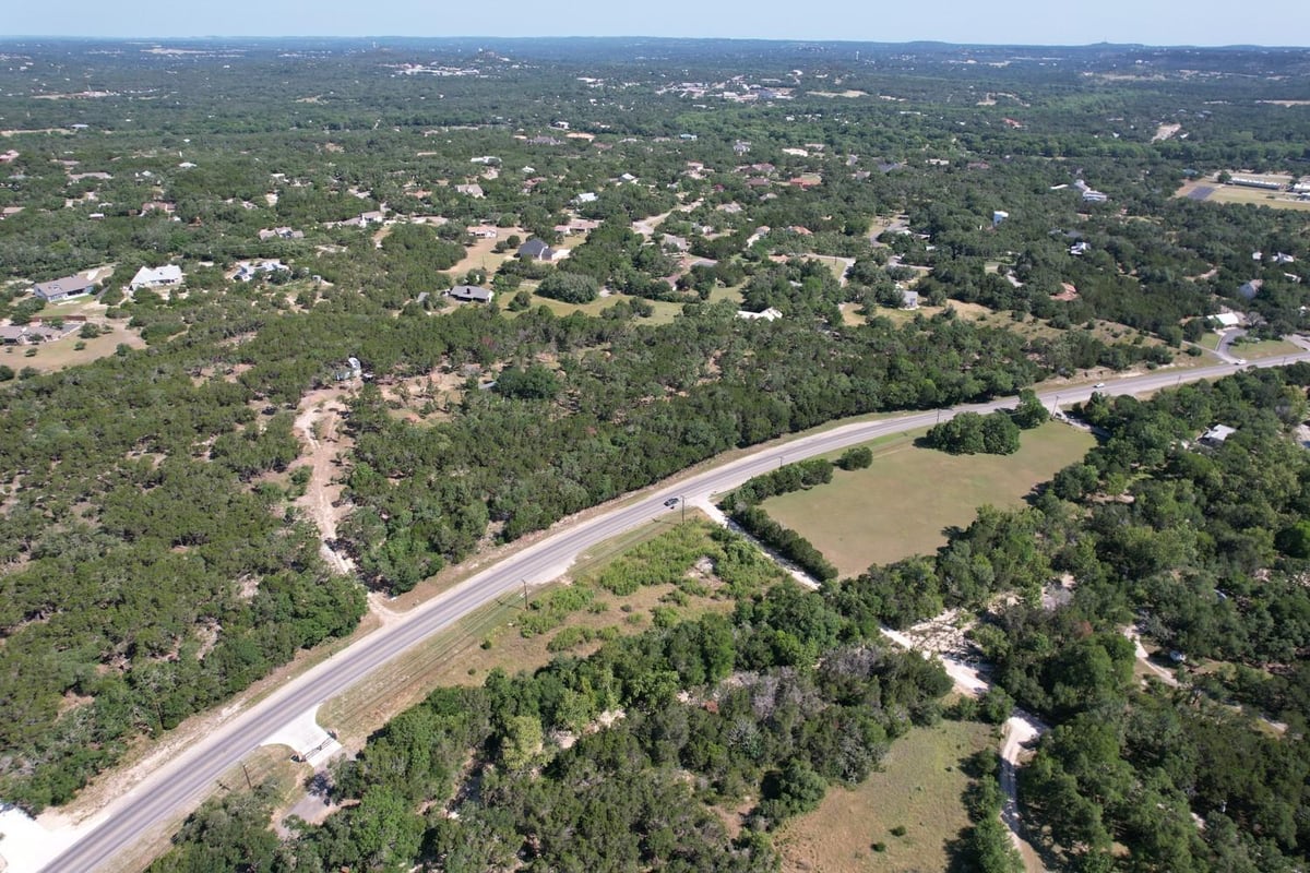 View 12333A Ranch Rd 12 Unit #1 12333A Ranch Rd 12 Unit #1 - front exterior - Luxury lot in Wimberley, TX