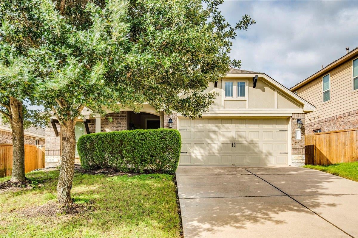 View 124 Compass Ln in Crosswinds Ph One 124 Compass Ln - front exterior - Luxury home in Crosswinds Ph One, Kyle, TX
