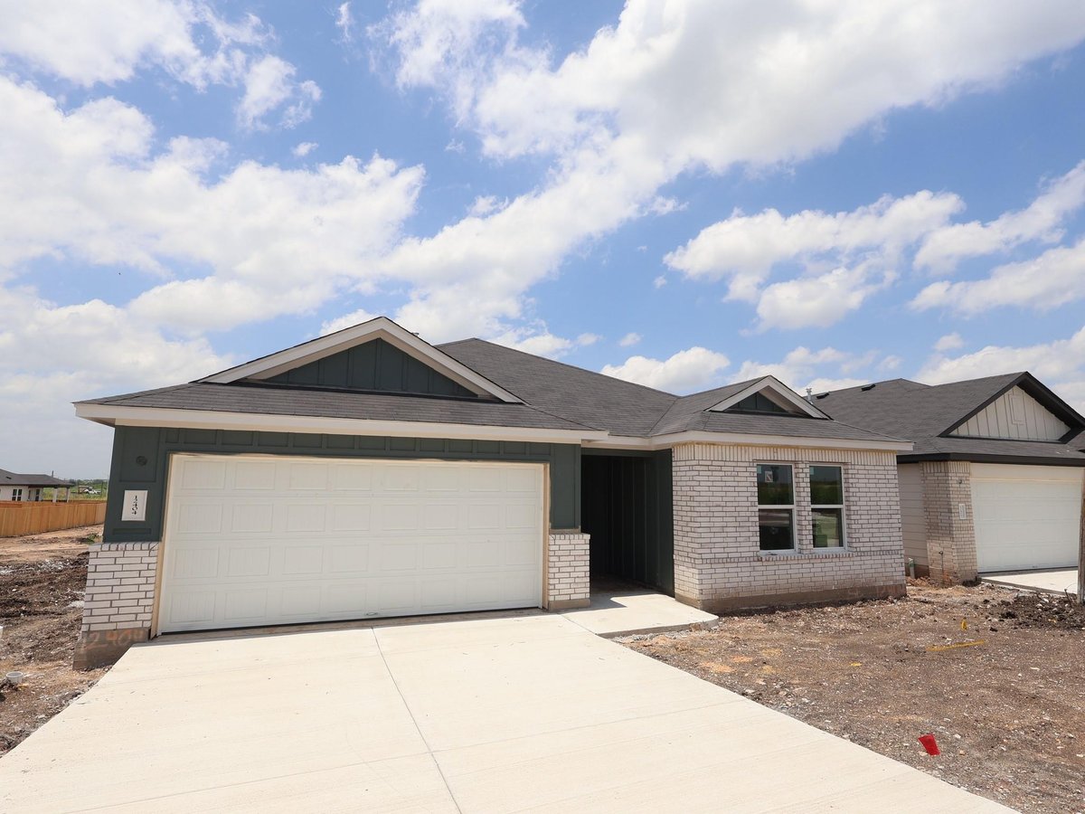 View 12404 Setting Peak LN in Willow Springs 12404 Setting Peak LN - front exterior - Luxury home in Willow Springs, Buda, TX
