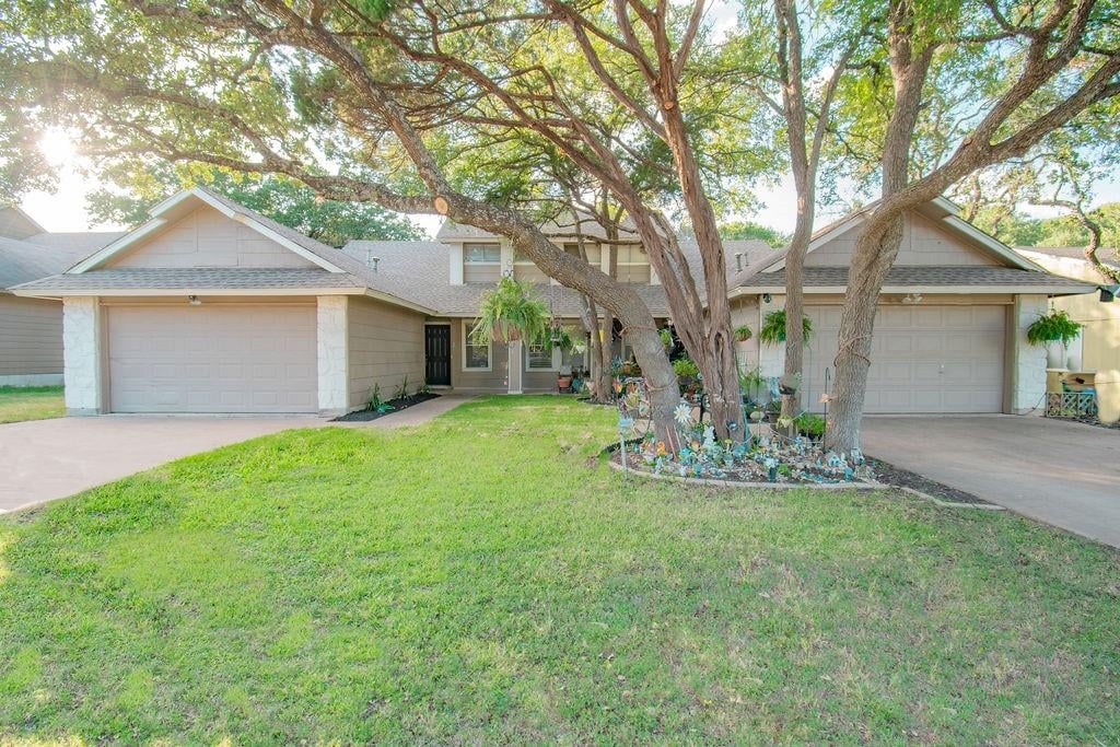 View 12408 Coronet St in Milwood Sec 06 12408 Coronet St - front exterior - Luxury home in Milwood Sec 06, Austin, TX