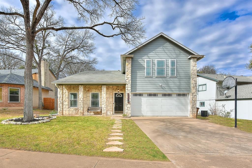 View 12410 Blossomwood Dr in Milwood Sec 07 12410 Blossomwood Dr - front exterior - Luxury home in Milwood Sec 07, Austin, TX