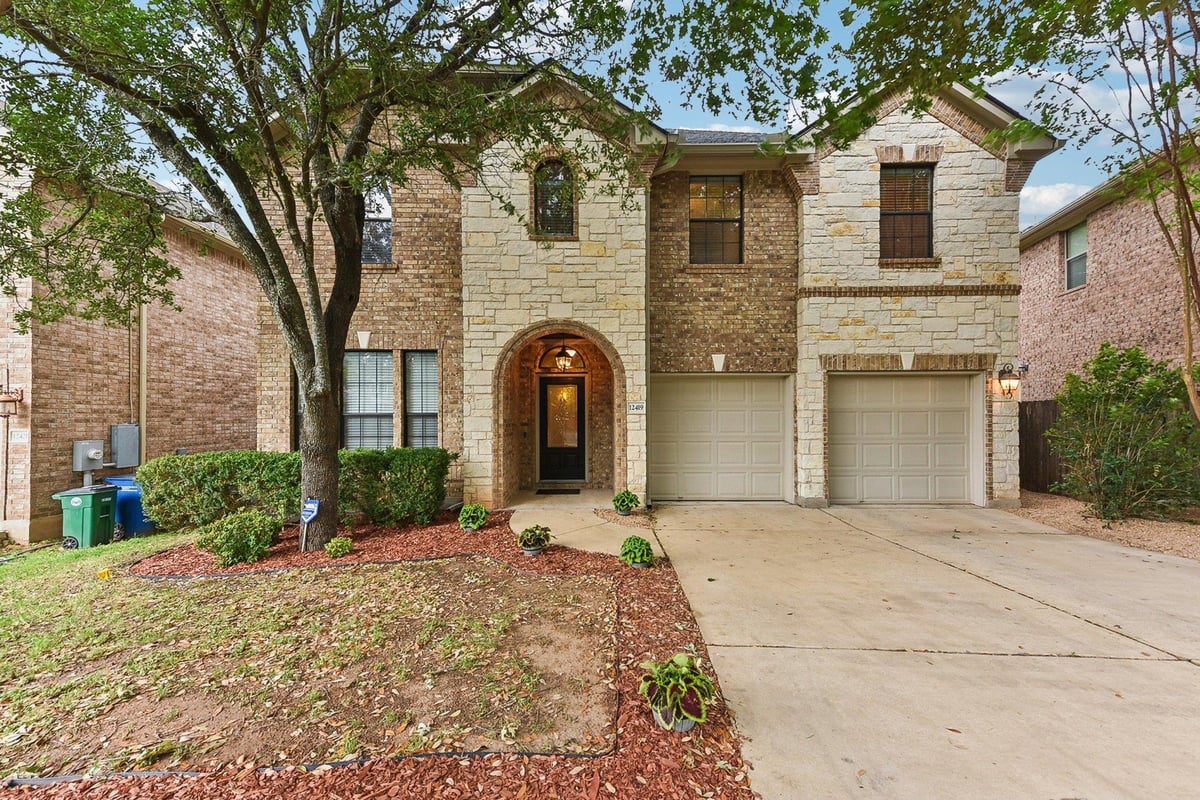 View 12419 Enchanted Forest Dr in Enchanted Forest 12419 Enchanted Forest Dr - front exterior - Luxury home in Enchanted Forest, Austin, TX