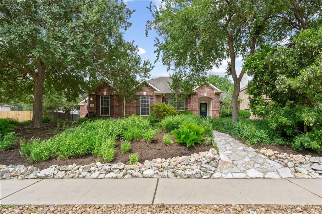 View 12420 Tabor Oaks Dr in Barker Ranch At Shady Hollow 12420 Tabor Oaks Dr - front exterior - Luxury home in Barker Ranch At Shady Hollow, Austin, TX