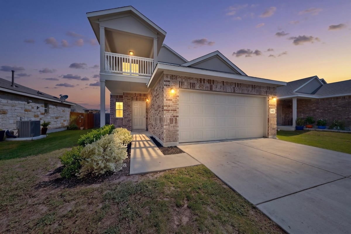 12432 Ostrich TRL - front exterior - Luxury home in Village at Manor Commons, Manor, TX