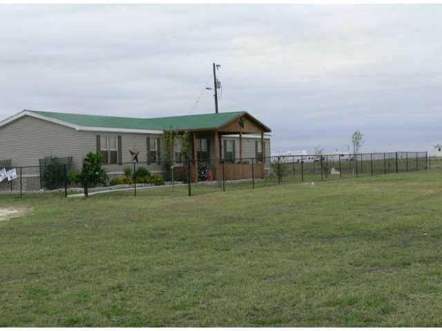View 1245 Williamson RD 1245 Williamson RD - front exterior - Luxury home in Lockhart, TX