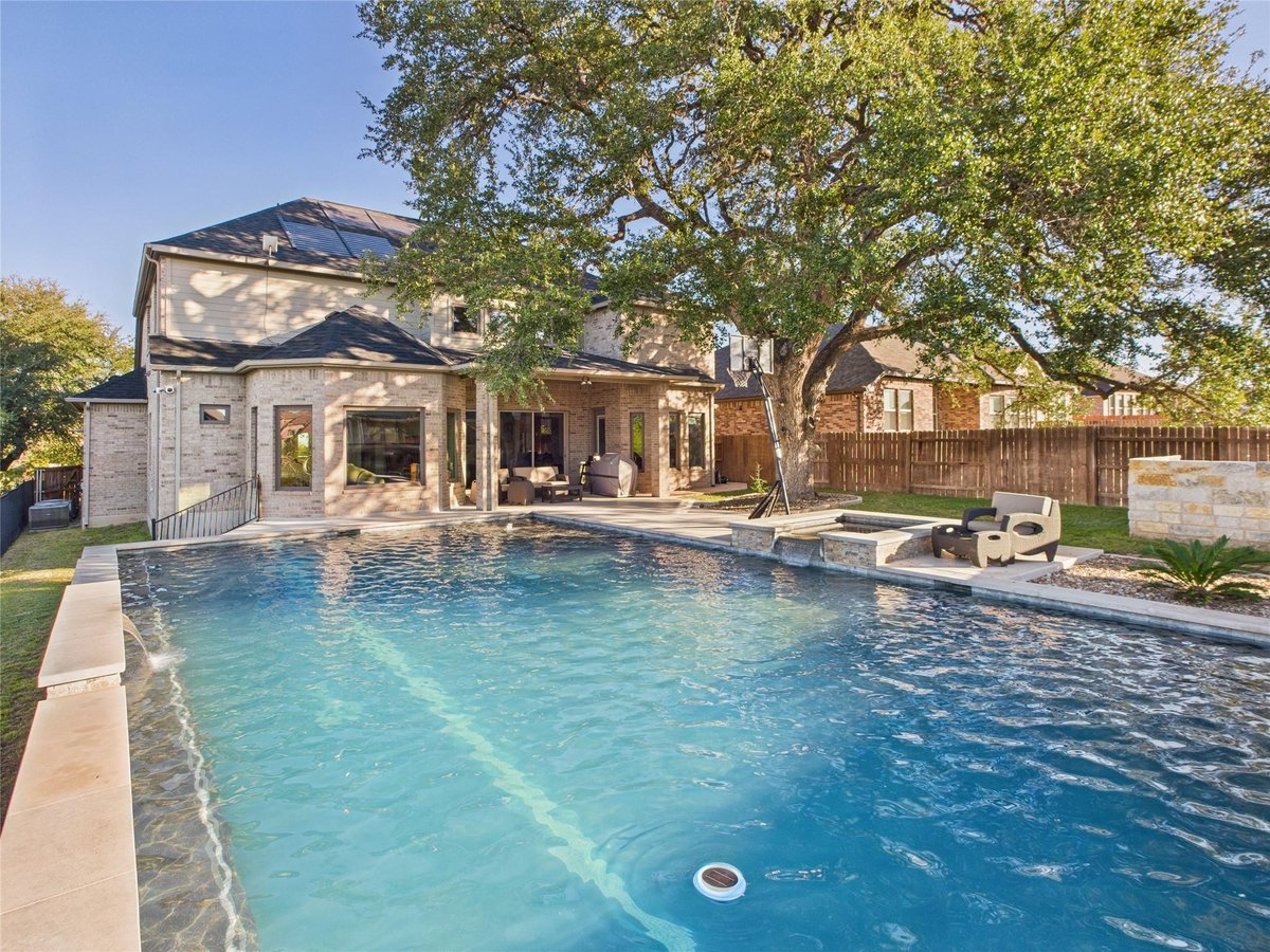 View 125 Frogfruit Way in La Cima Ph I Sec 1 125 Frogfruit Way - front exterior - Luxury home in La Cima Ph I Sec 1, San Marcos, TX
