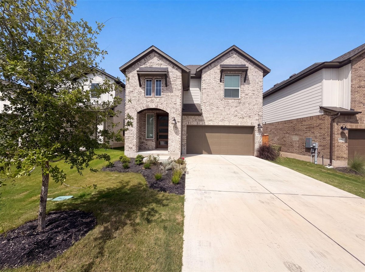 View 125 High Valley DR in Lariat 125 High Valley DR - front exterior - Luxury home in Lariat, Liberty Hill, TX