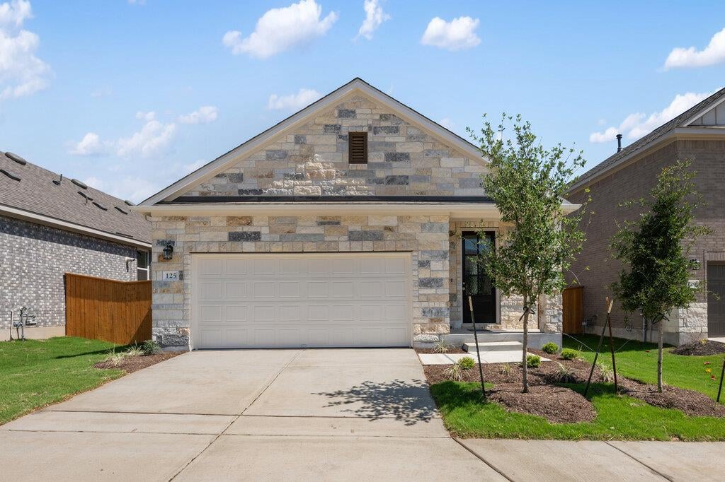 View 125 Knockout Rose Dr in La Cima 125 Knockout Rose Dr - front exterior - Luxury home in La Cima, San Marcos, TX