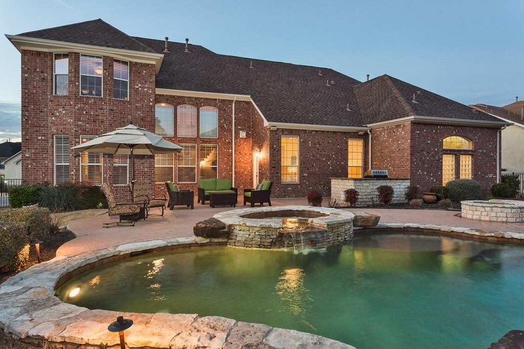 View 125 Lakota Pass in Ridge At Alta Vista 125 Lakota Pass - front exterior - Luxury home in Ridge At Alta Vista, Austin, TX