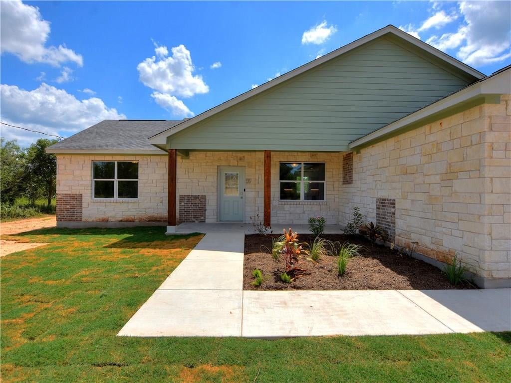 View 125 Naalehu CT 125 Naalehu CT - front exterior - Luxury home in Bastrop, TX