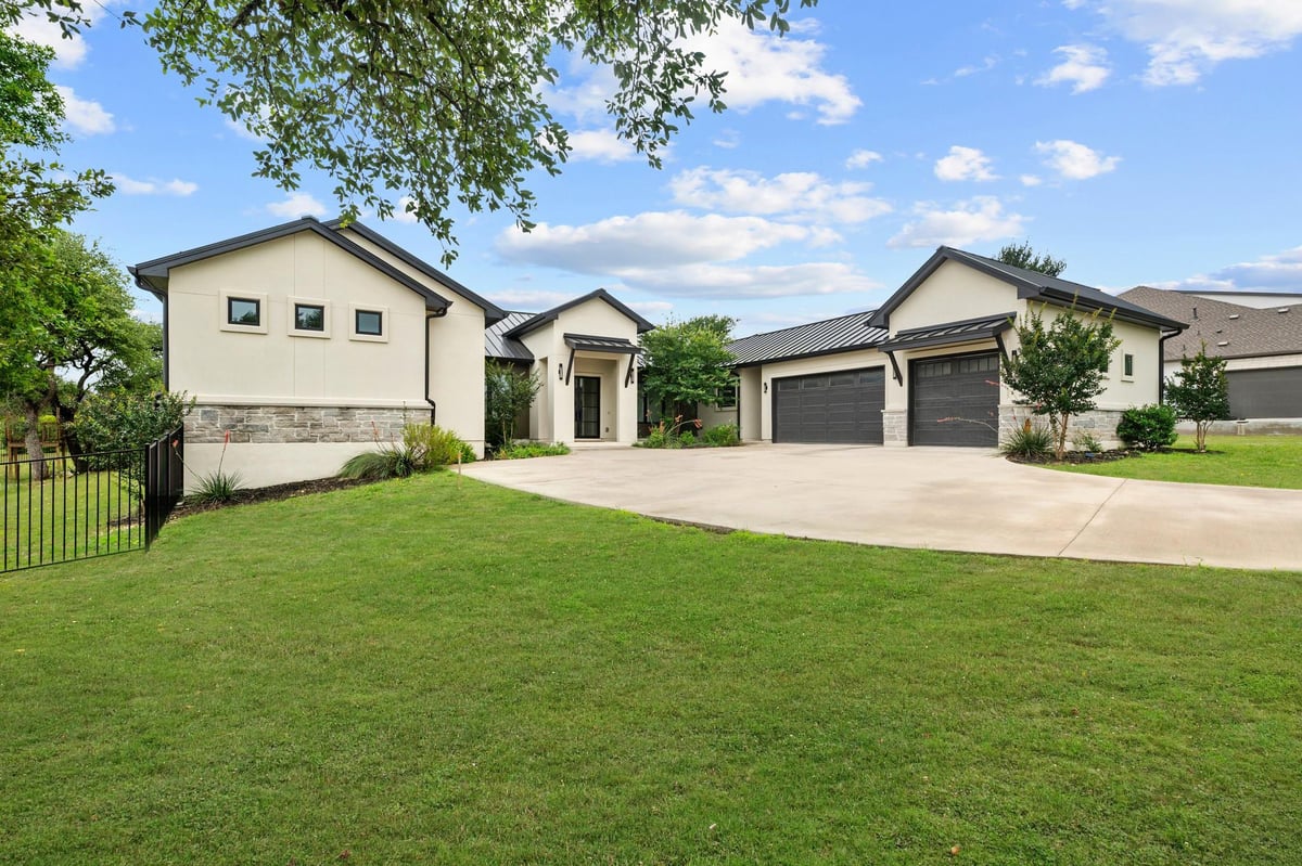 View 125 Stockman DR in Bunker Ranch Ph 2 125 Stockman DR - front exterior - Luxury home in Bunker Ranch Ph 2, Dripping Springs, TX