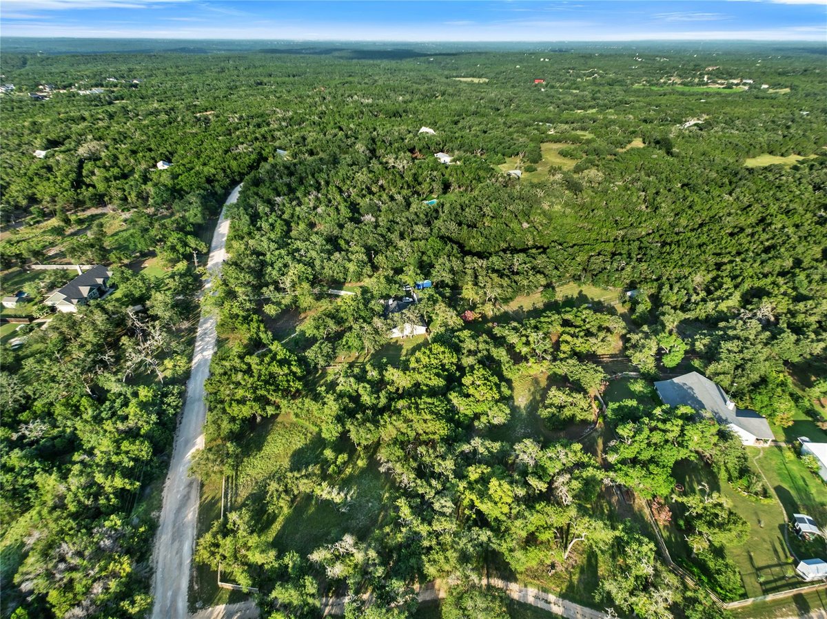 View 1250 S Rainbow Ranch RD in Rainbow Ranch 1250 S Rainbow Ranch RD - front exterior - Luxury home in Rainbow Ranch, Wimberley, TX