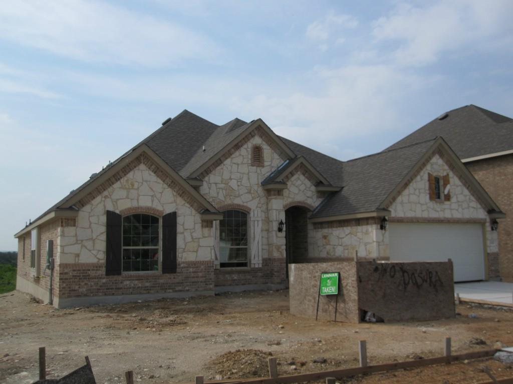 View 12502 Morelia Way in Enclave at Estancia 12502 Morelia Way - front exterior - Luxury home in Enclave at Estancia, Austin, TX