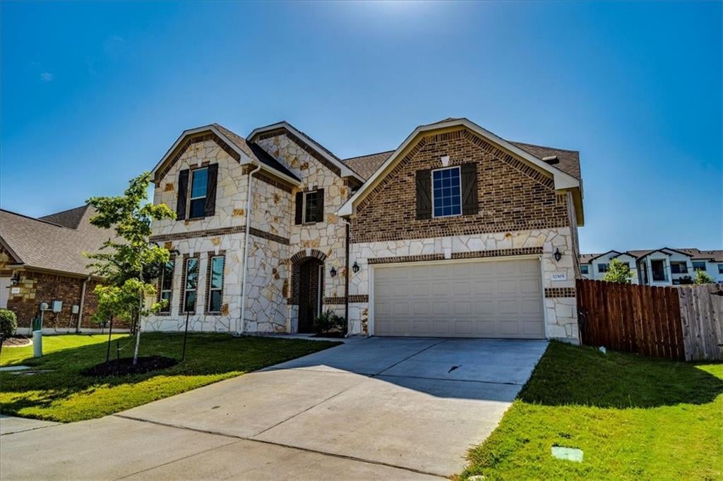 View 12505 Morelia Way in Enclave at Estancia 12505 Morelia Way - front exterior - Luxury home in Enclave at Estancia, Austin, TX