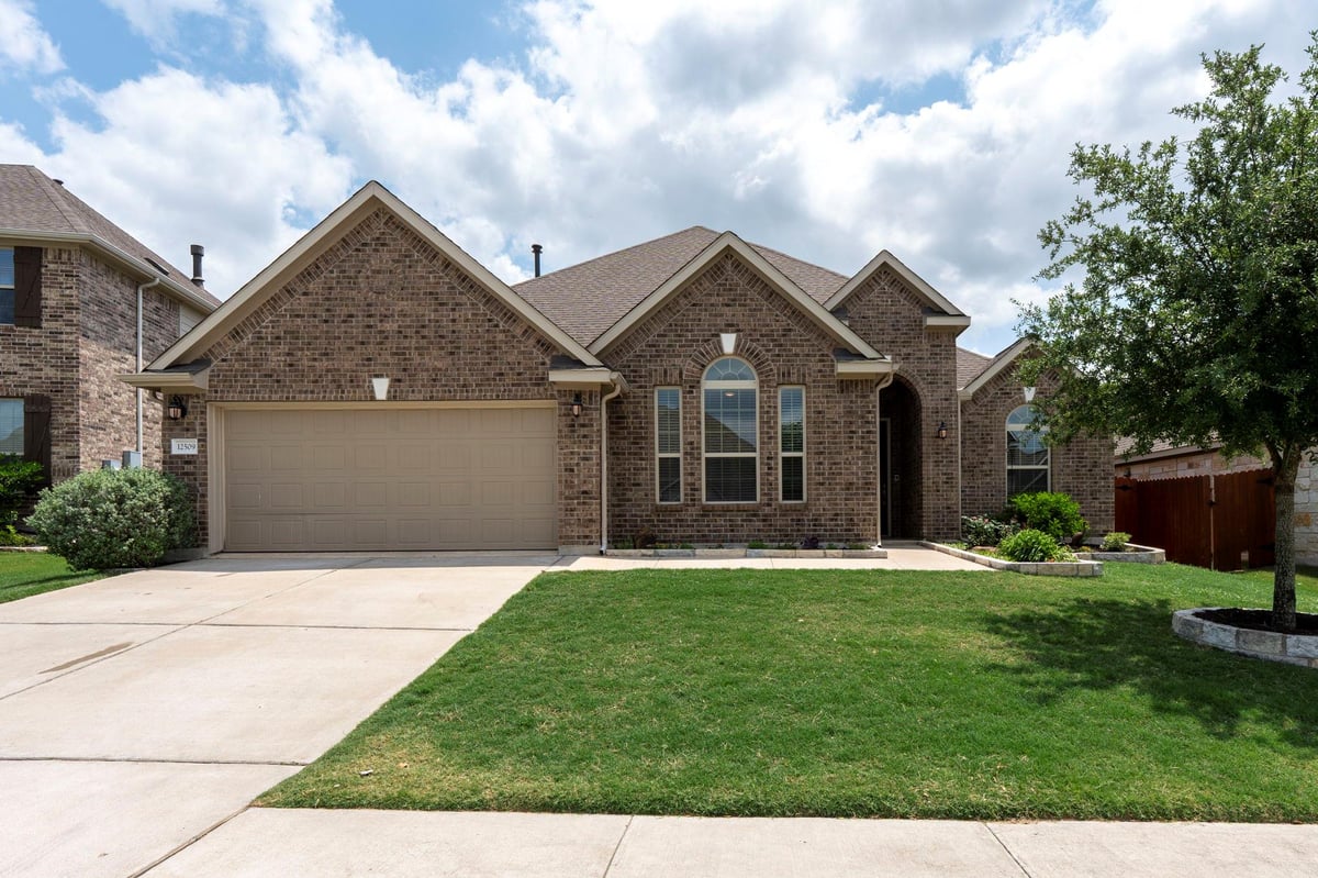 View 12509 Morelia Way in Enclave at Estancia 12509 Morelia Way - front exterior - Luxury home in Enclave at Estancia, Austin, TX