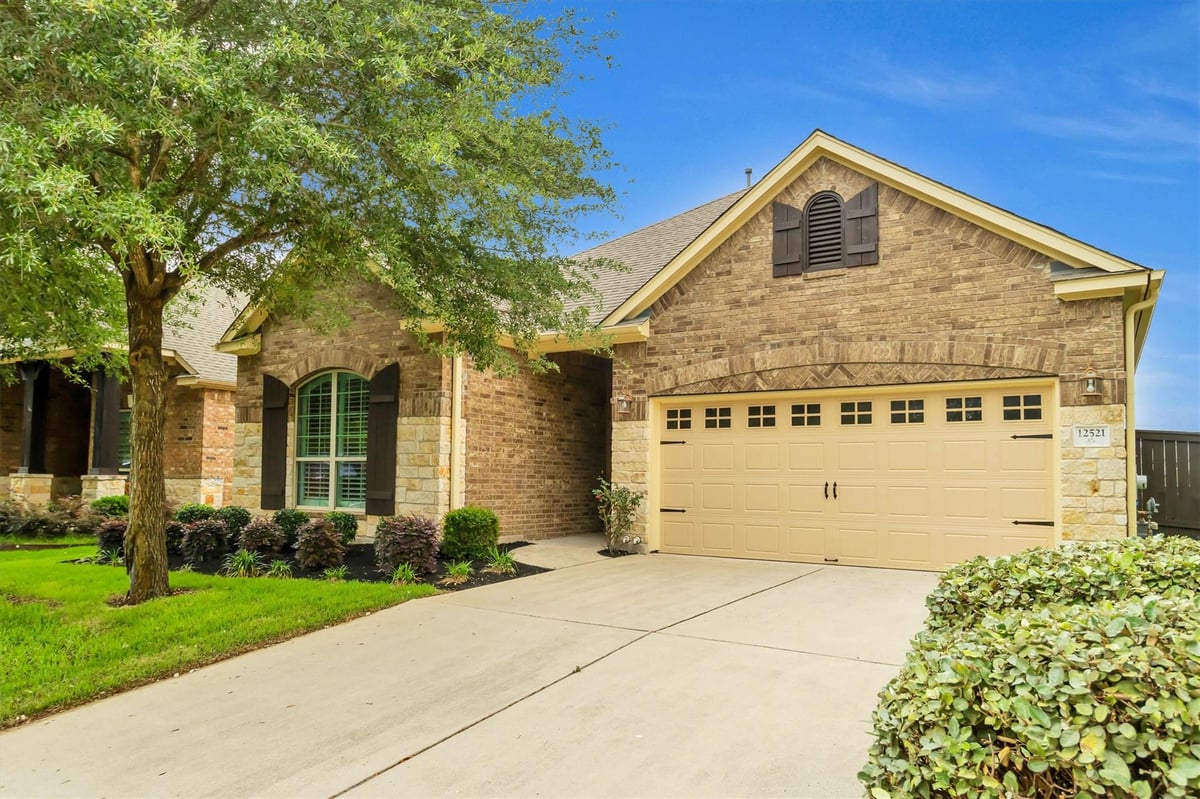 View 12521 Black Hills DR in Bridges Of Bear Creek Ph 1 SE 12521 Black Hills DR - front exterior - Luxury home in Bridges Of Bear Creek Ph 1 SE, Austin, TX