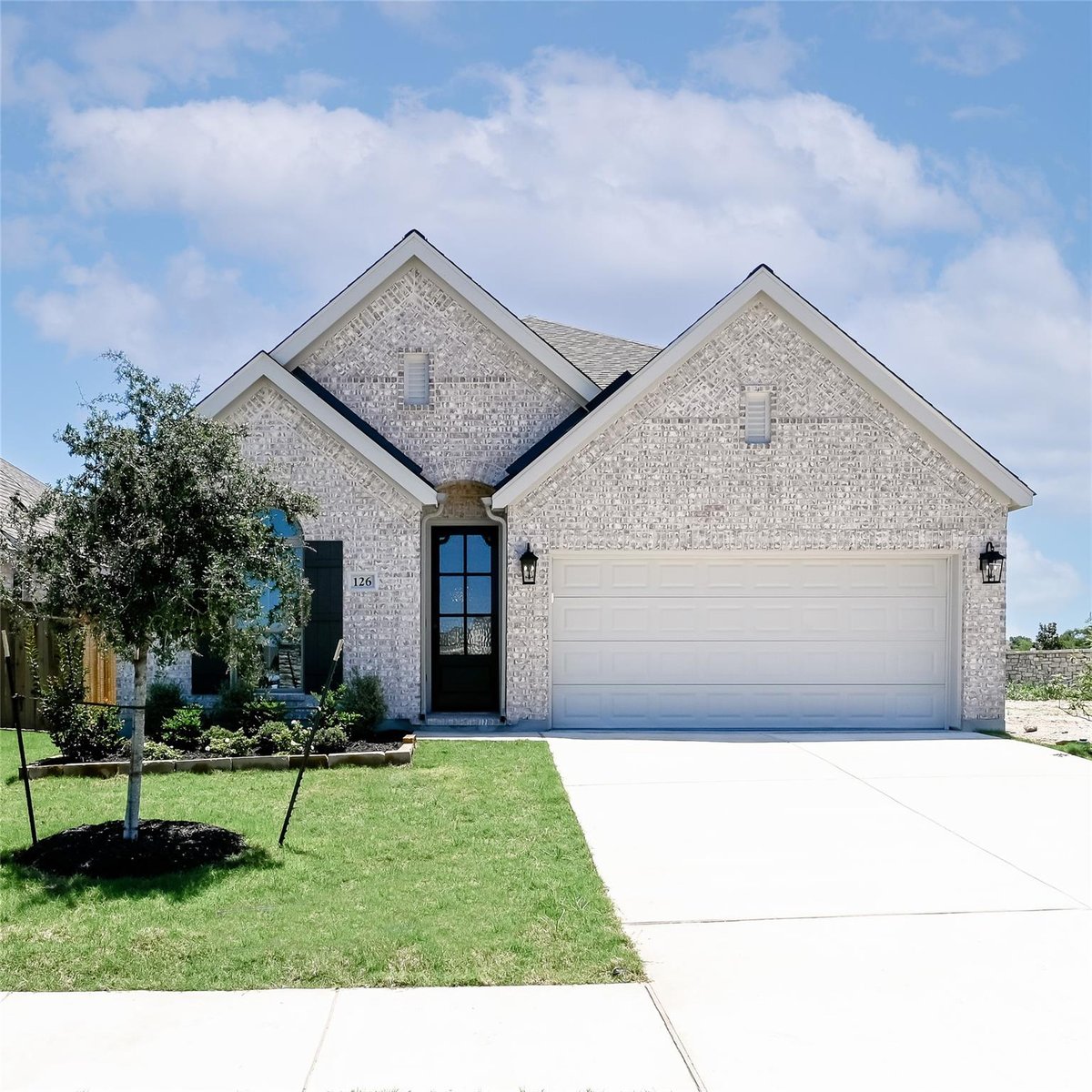 View 126 Basket Flower LOOP in 6 Creeks 126 Basket Flower LOOP - front exterior - Luxury home in 6 Creeks, Kyle, TX
