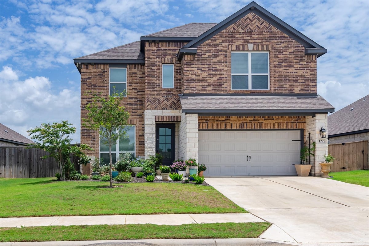 View 126 Periwinkle Ln in Colony Mud 1B Sec 3 126 Periwinkle Ln - front exterior - Luxury home in Colony Mud 1B Sec 3, Bastrop, TX