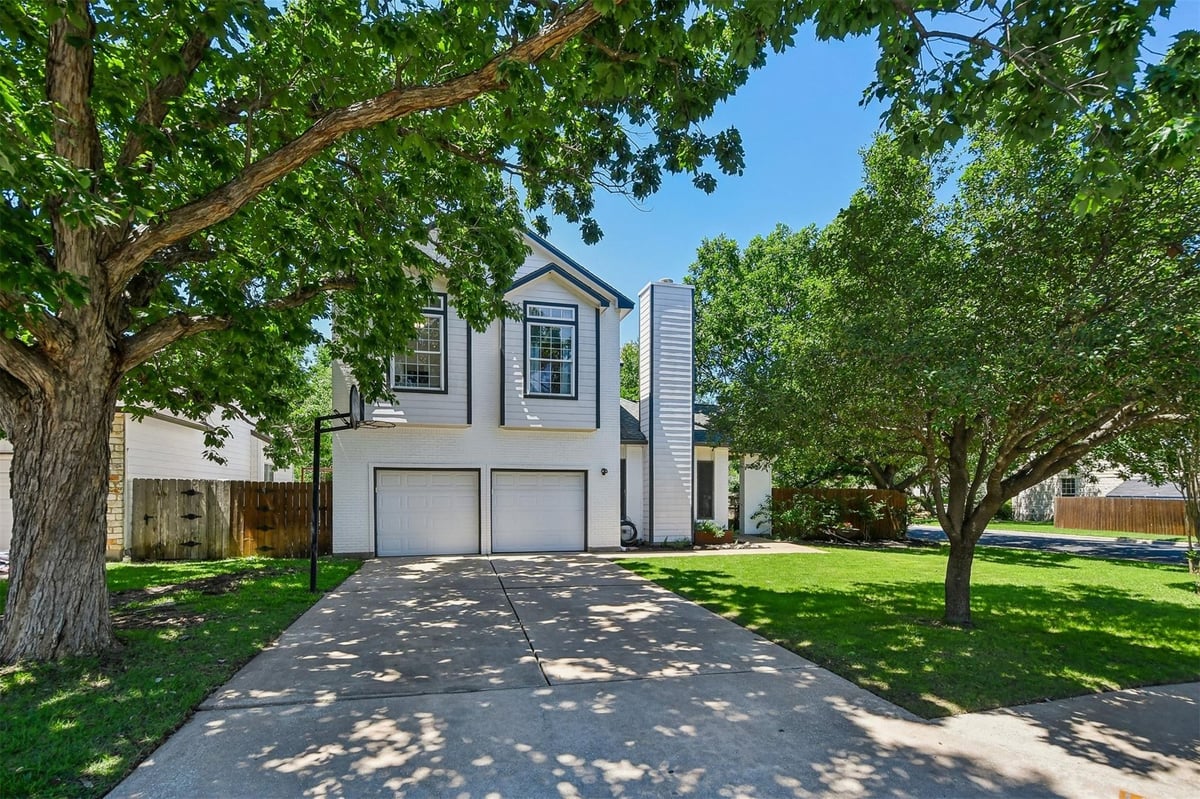 View 12606 Deer Falls Dr in Hunters Chase Sec 02 12606 Deer Falls Dr - front exterior - Luxury home in Hunters Chase Sec 02, Austin, TX