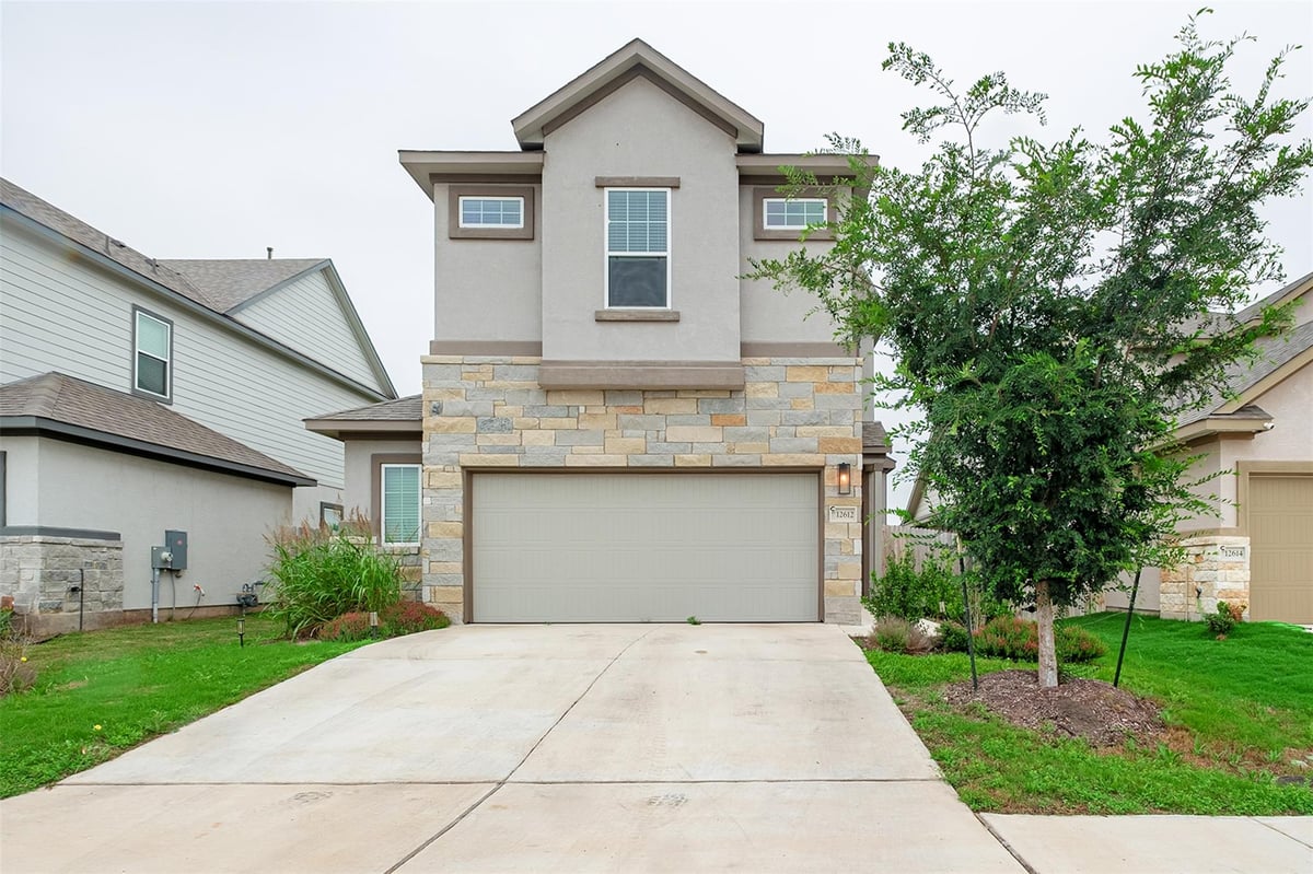 12612 Penguin PATH - front exterior - Luxury home in The Village of Manor Commons, Manor, TX