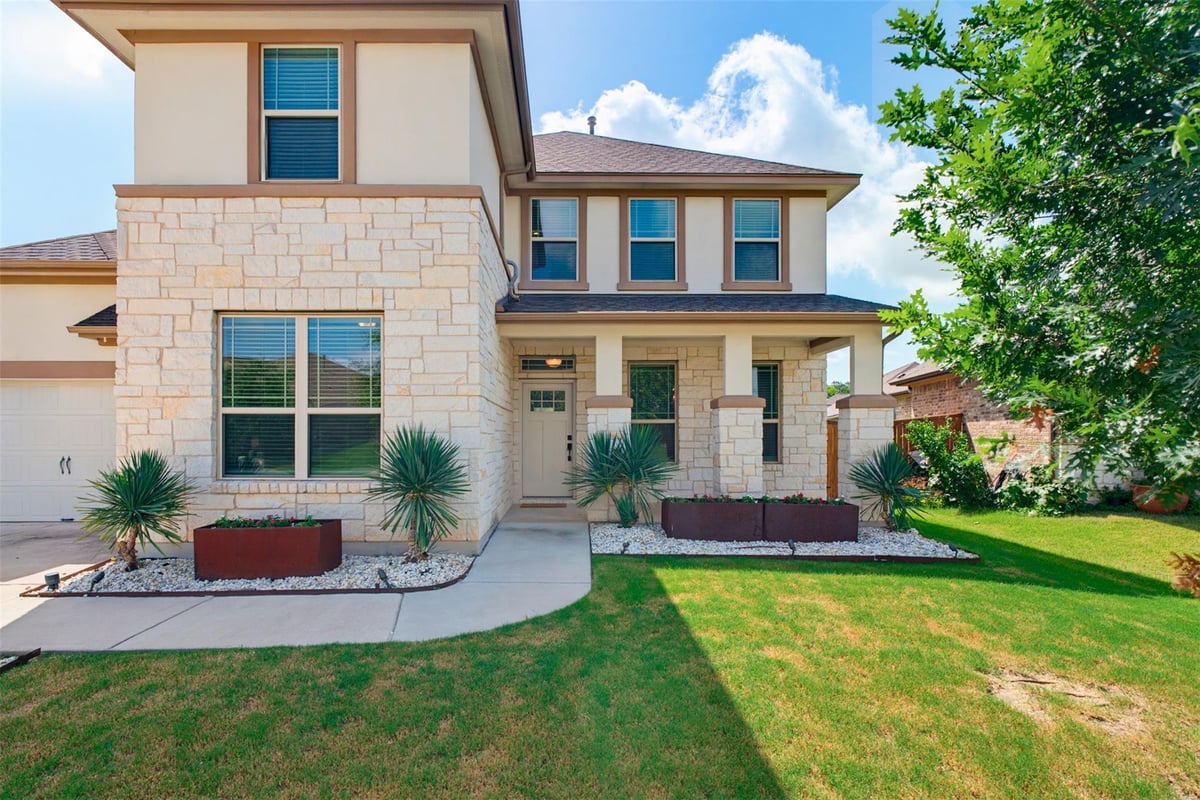 View 12613 Twisted Root DR in Bear Creek Crossing 12613 Twisted Root DR - front exterior - Luxury home in Bear Creek Crossing, Manchaca, TX