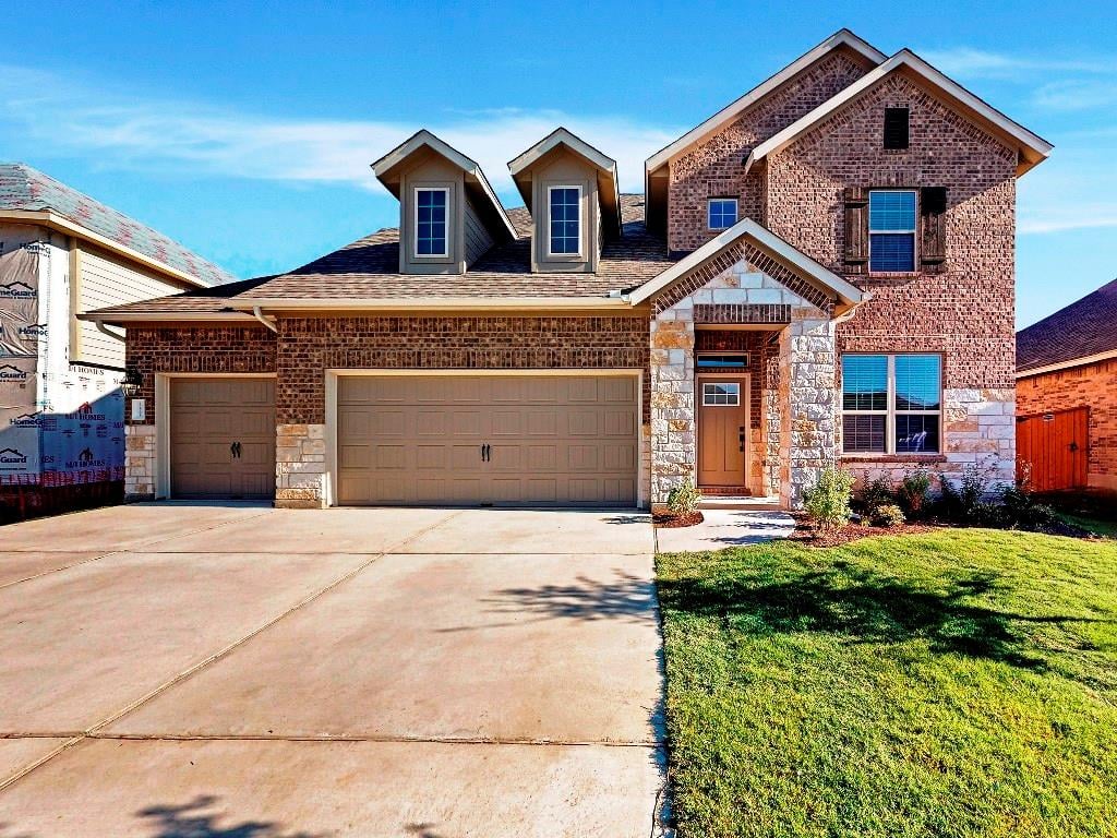 View 12705 Twisted Root DR 12705 Twisted Root DR - front exterior - Luxury home in Manchaca, TX