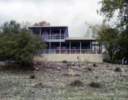 View 12707 FM 2325 12707 FM 2325 - property photo 1 - Luxury home in Wimberley, TX