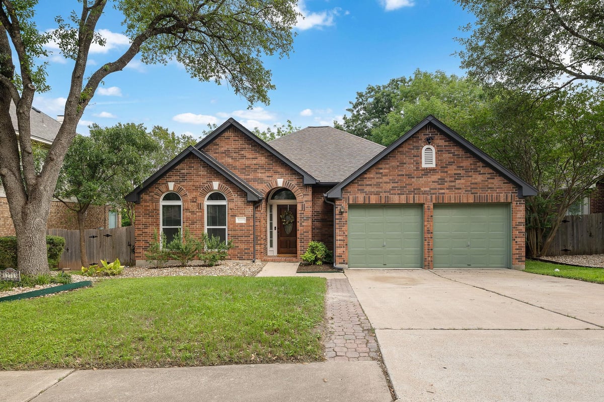 View 12713 Cinchring Ln in Scofield Farms 12713 Cinchring Ln - front exterior - Luxury home in Scofield Farms, Austin, TX