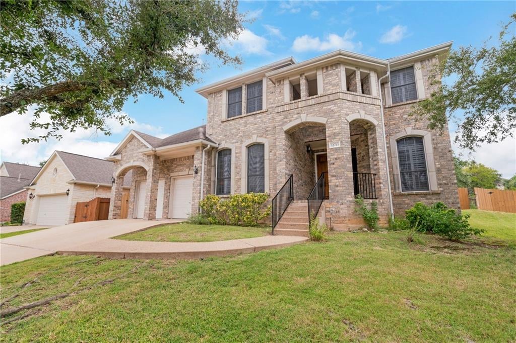 View 12713 Cloud Mountain Xing in Grandview Hills Sec 04 12713 Cloud Mountain Xing - front exterior - Luxury home in Grandview Hills Sec 04, Austin, TX