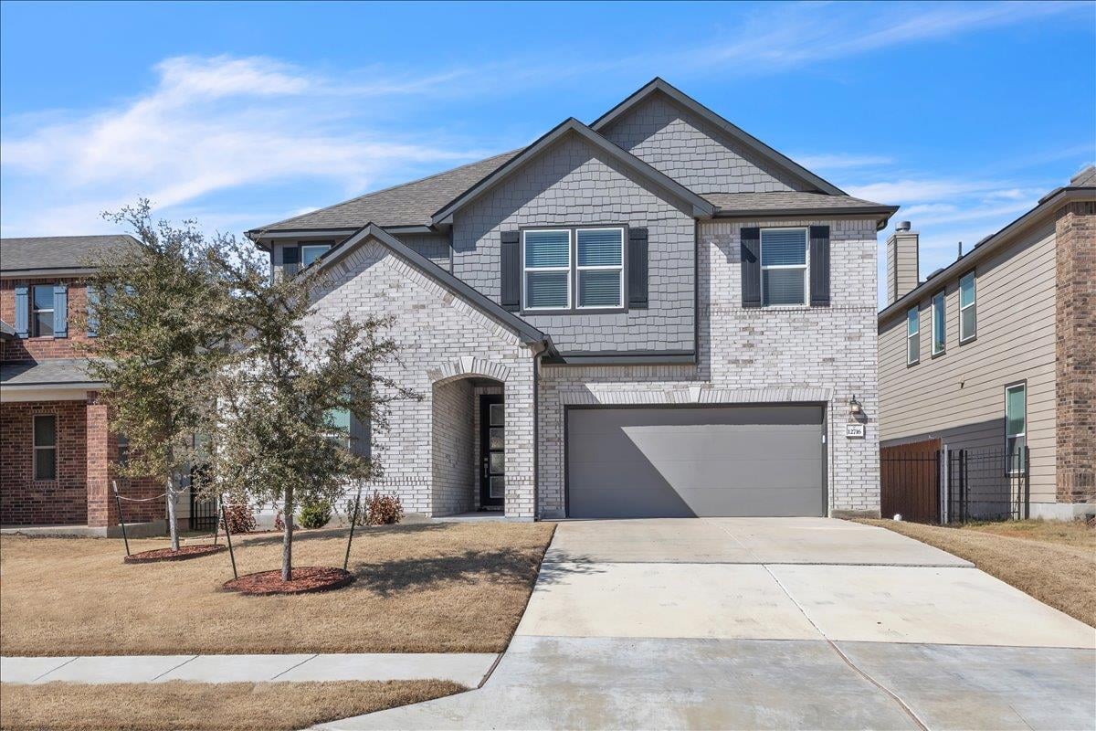 12716 Mogador St - front exterior - Luxury home in East Village, Manor, TX