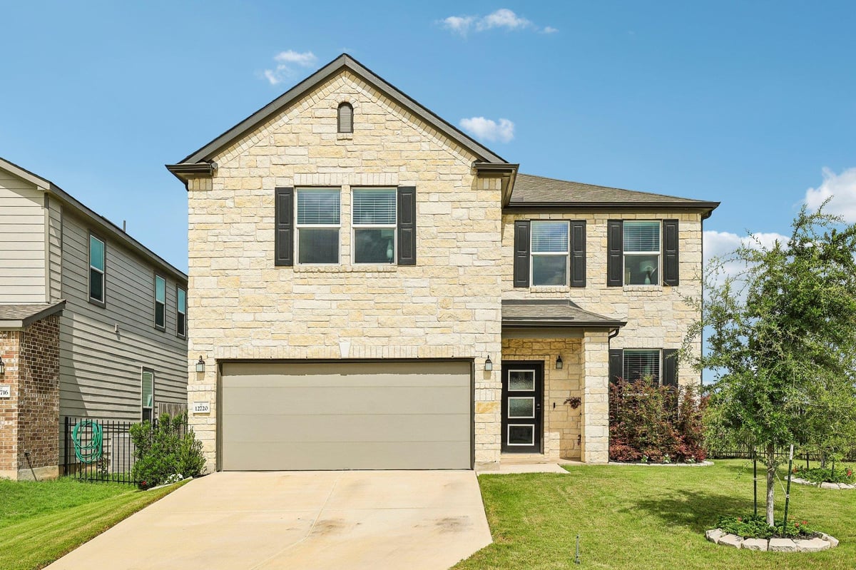 View 12720 Oxford Vineyard LN in Eastvillage Single Family Ph 2 12720 Oxford Vineyard LN - front exterior - Luxury home in Eastvillage Single Family Ph 2, Manor, TX