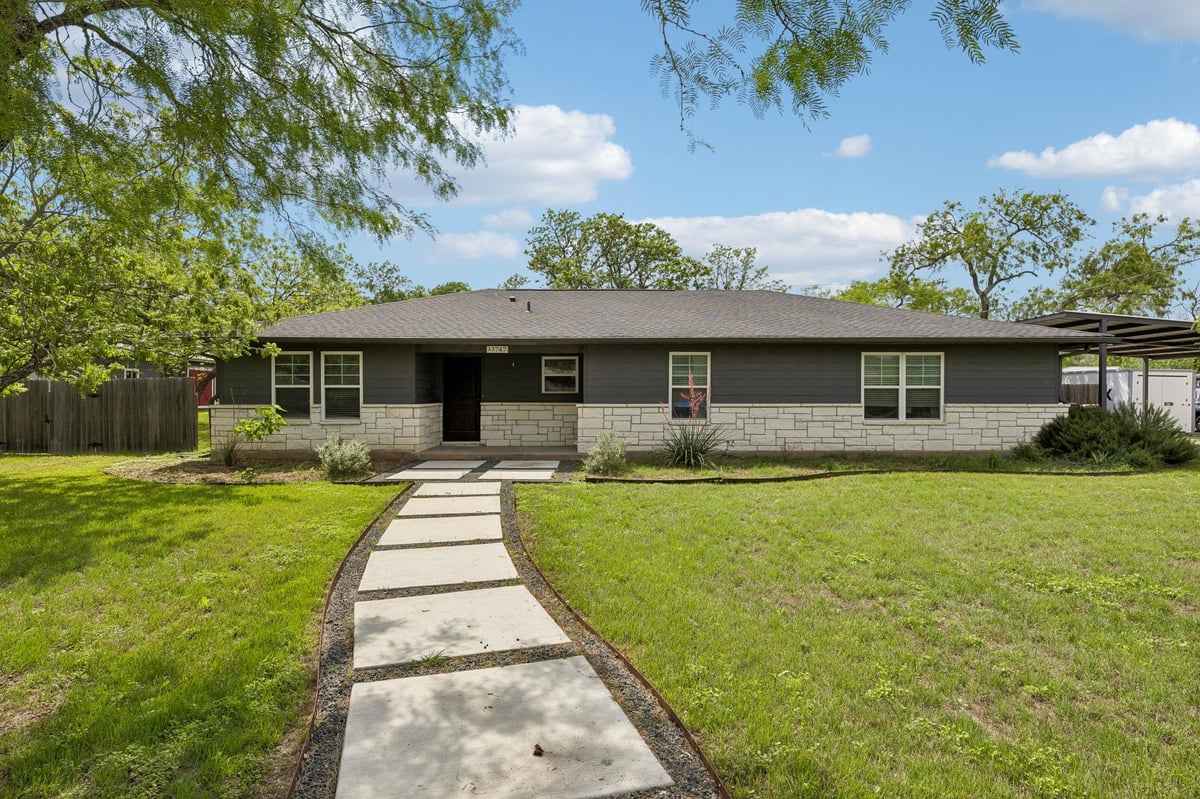 View 12747 Burson Dr in Bear Creek Park 12747 Burson Dr - front exterior - Luxury home in Bear Creek Park, Manchaca, TX