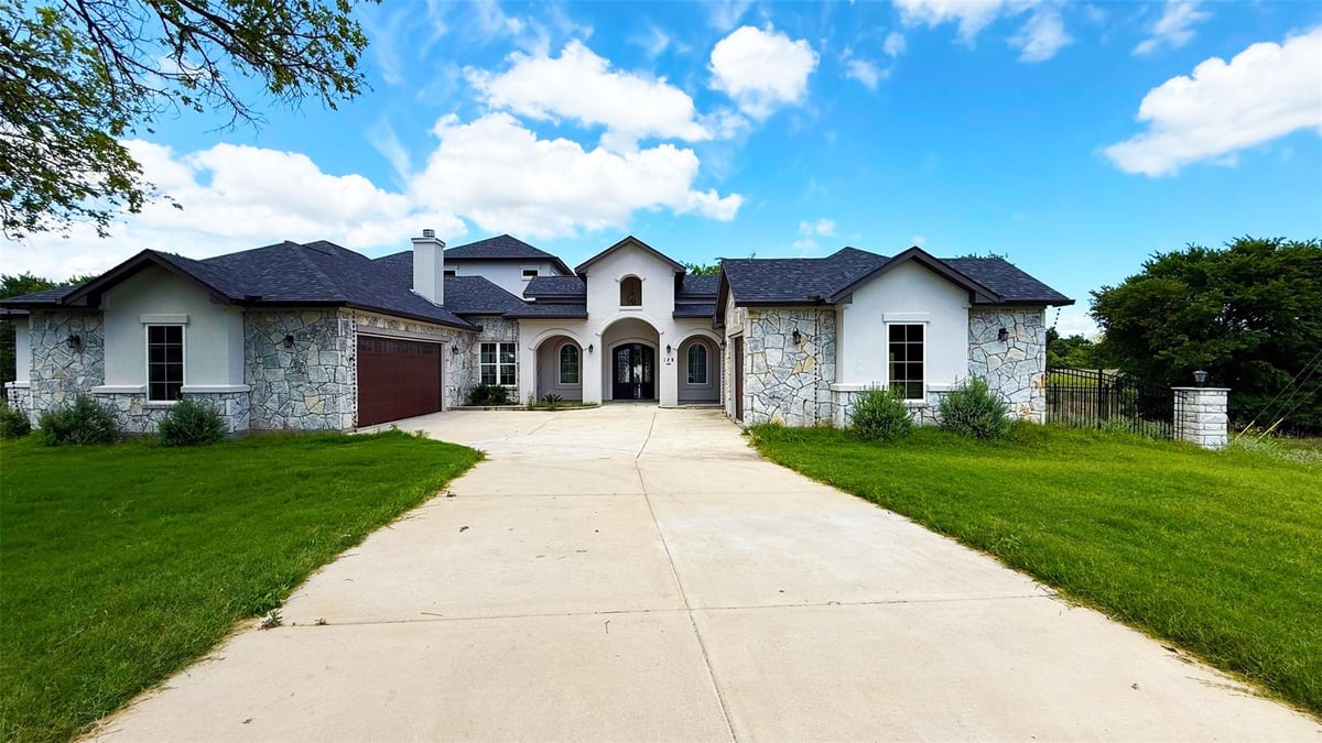 View 128 Gloria Blvd in Hurta River Estates 128 Gloria Blvd - front exterior - Luxury home in Hurta River Estates, Smithville, TX