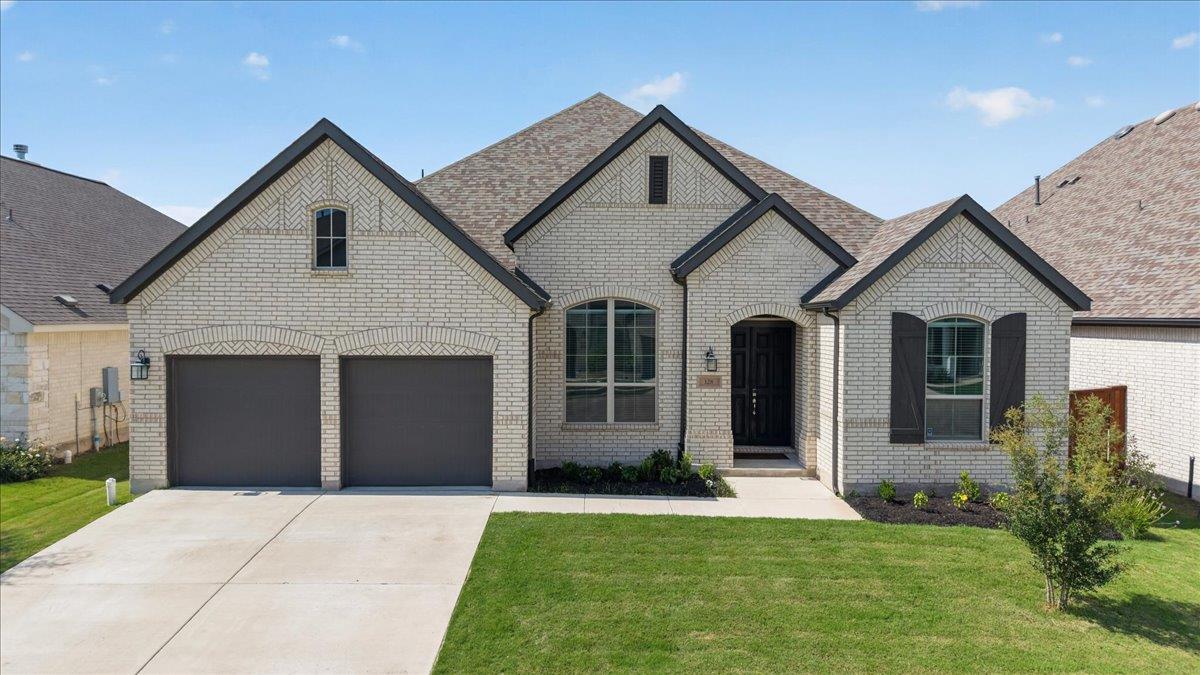View 128 Lockhart DR in Santa Rita Ranch 128 Lockhart DR - front exterior - Luxury home in Santa Rita Ranch, Liberty Hill, TX